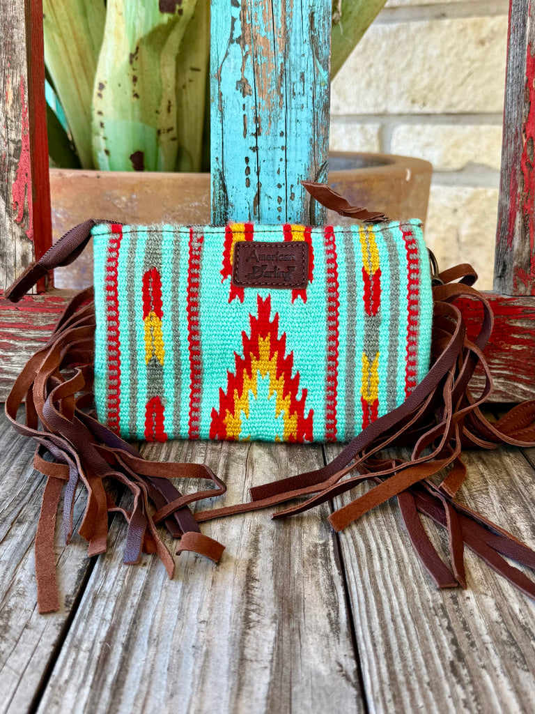 Women's American Darling Crossbody Tool Bag in Mint Multi, handwoven wool saddle blanket body in Southwestern pattern, with genuine leather fringe accents - ADGBZ234. Available at Blair's Western Wear, Marble Falls, TX.