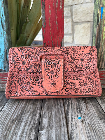 Women’s American Darling clutch tool flap strap wallet in coral, hand-tooled genuine leather exterior, with secure snap-flap closure – ADBG1134J. Available at Blair's Western Wear, Marble Falls, TX.