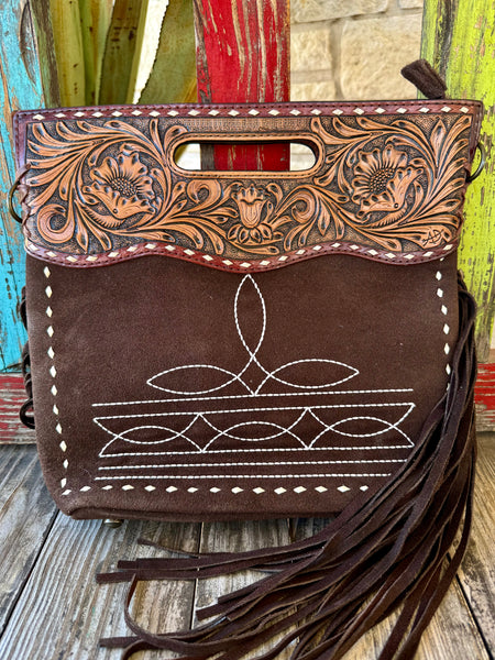 Women's American Darling crossbody suede purse in brown, featuring hand-tooled floral leather detailing and long suede fringe accents, with an adjustable tooled strap and exterior zip pocket - ADBG1584A. Available at Blair's Western Wear, Marble Falls, TX.