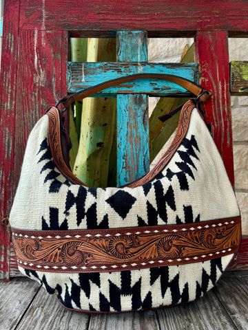 Women’s American Darling purse Aztec blanket purse in black and ivory, woven Aztec blanket front panel for textured style, with hand-tooled leather detailing for durability - ADBGZ3100. Available at Blair's Western Wear, Marble Falls, TX.