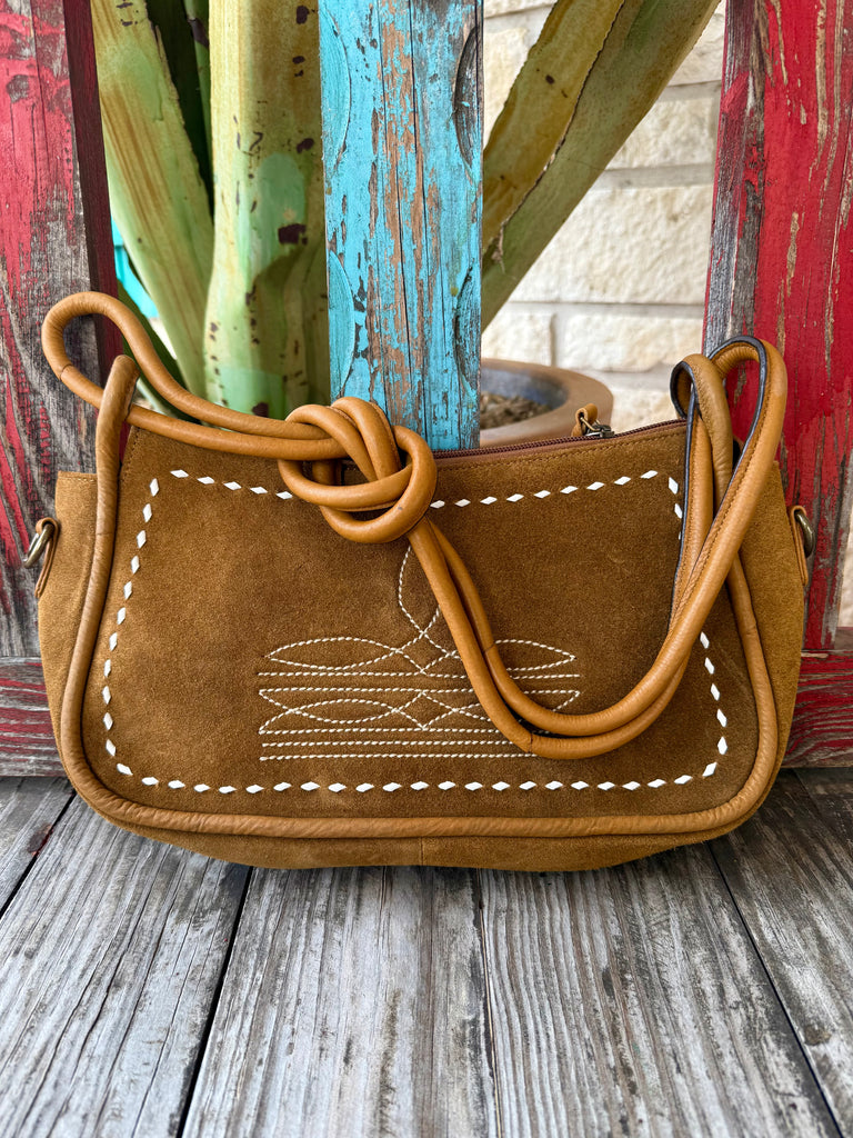 Women’s American Darling purse suede leather handbag in tan, soft suede leather with white whipstitch embroidery, with reinforced leather trim for durability – ADBGM528A. Available at Blair's Western Wear, Marble Falls, TX.