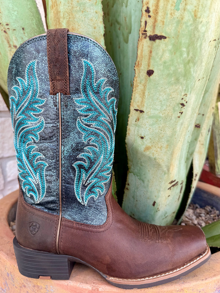 Women’s Ariat Western Boot in Sassy Brown and Ocean Wave, built from full-grain leather for durability, with ATS® cushioning for all-day comfort – 10064077. Available at Blair’s Western Wear, Marble Falls, TX.
