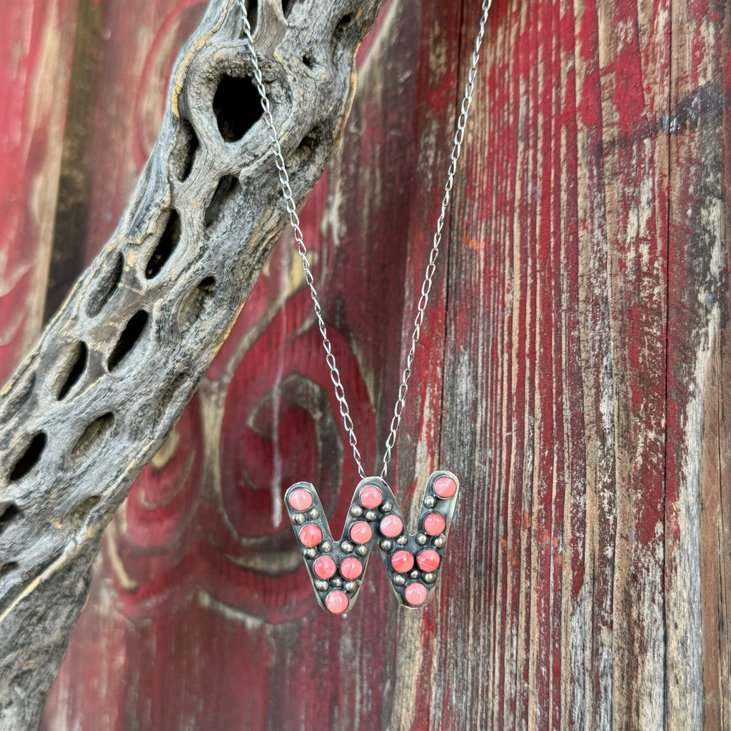 Women’s BOHO SOL Necklace Letter W in Coral, features pink coral inlays for natural color, with sterling silver beaded detailing for added texture – T320C.W. Available at Blair's Western Wear, Marble Falls, TX.