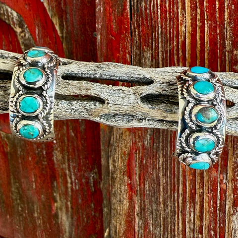 Women’s Boho oval semi-hoop earrings in silver with turquoise stones, featuring lightweight construction and secure post-back comfort – T1504. Available at Blair's Western Wear, Marble Falls, TX.