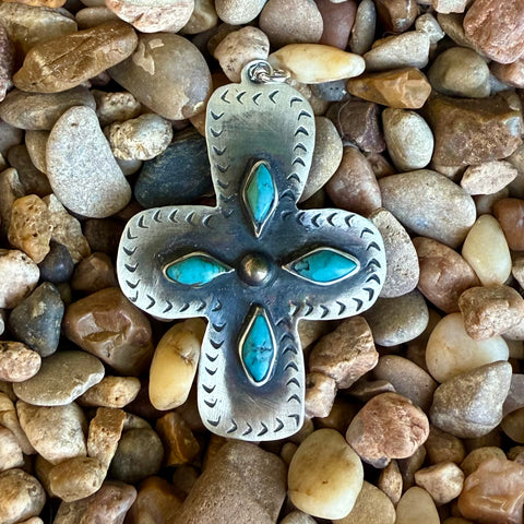 Women’s Boho Sol cross pendant turquoise necklace pendant in silver-tone, featuring genuine turquoise stones, with engraved and oxidized detailing for added depth – T288. Available at Blair's Western Wear, Marble Falls, TX.