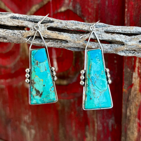 Women’s Boho trapezoid turquoise earrings in turquoise, featuring unique natural stone veining, with lightweight sterling-tone frames for comfortable wear - T1502. Available at Blair's Western Wear, Marble Falls, TX.