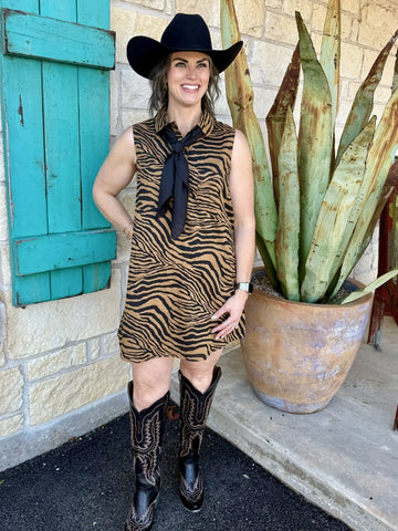 Women’s brown zebra print sleeveless shirt dress with relaxed fit and button-down front, lightweight breathable fabric - A4026. Available at Blair's Western Wear, Marble Falls, TX.