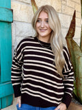 DZ26E389 — Women's dark chocolate brown and tan/cream horizontal stripe oversized long sleeve knit sweater with relaxed boxy fit, crew/round neckline with ribbed edge, full-length sleeves with ribbed cuffs, and ribbed hem band at the hip — Blair's Western Wear Marble Falls TX