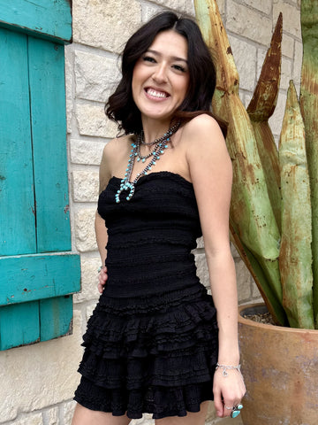 Women’s black strapless smocked ruffle mini dress with tiered skirt and built-in shorts lining - G6859. Available at Blair's Western Wear, Marble Falls, TX.