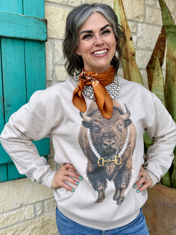 Women’s graphic sweatshirt pullover in light gray, bison print with blingy embellished necklace and rhinestone accents, soft fleece interior - Blingy Bison. Available at Blair's Western Wear, Marble Falls, TX.