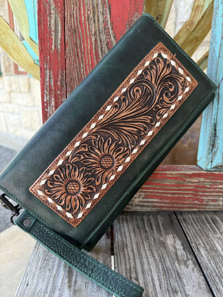 Women's hunter green genuine leather wristlet with hand-tooled sunflower and scroll panel framed by cream lacing — Blair's Western Wear Marble Falls TX