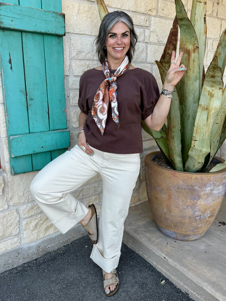T6946 — Back view of women's ivory super high rise wide leg cuffed jeans showing super high rise waistband, clean patch-style back pockets with minimal stitching, wide leg, and deep rolled cuff at ankle — Blair's Western Wear Marble Falls TX