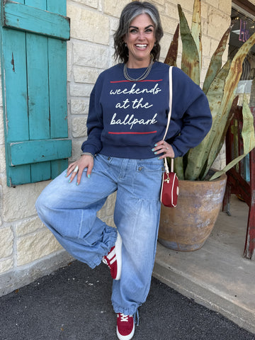 Women’s light wash wide leg denim jeans with adjustable drawstring hem and utility pocket details - VP71777. Available at Blair's Western Wear, Marble Falls, TX.