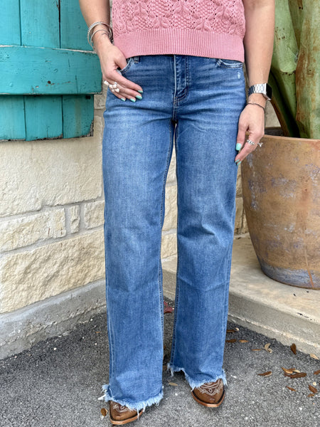 Women’s jeans wide leg denim jeans in medium wash, frayed raw hem with comfortable stretch fit - R1075. Available at Blair's Western Wear, Marble Falls, TX.