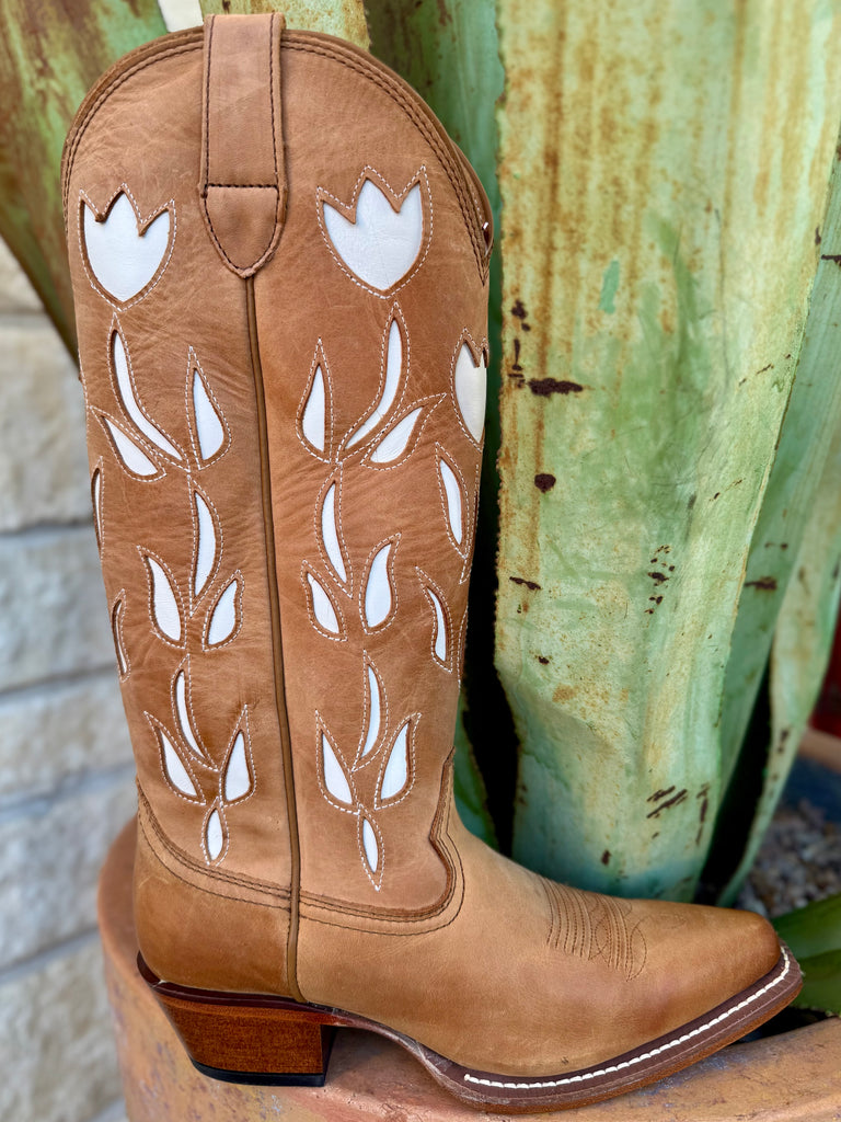 Women’s Justin Western snip toe boot in tan leather, full-grain leather construction that softens with wear while maintaining structure for long-term durability and white tulip inlays along the shaft that create bold contrast and highlight classic Western styling – VN4456. Available at Blair's Western Wear, Marble Falls, TX.