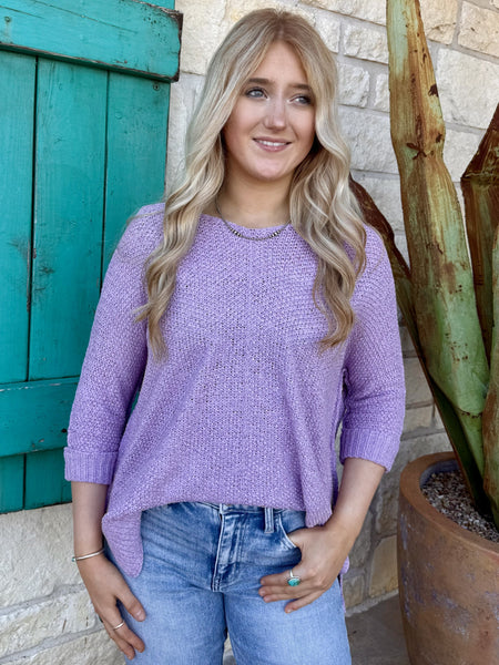 Women’s lavender sweater knit top with lightweight fabric and relaxed fit, featuring 3/4 sleeves and longer back hem - SG8414P. Available at Blair's Western Wear, Marble Falls, TX.
