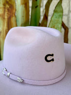  Light pink felt cowgirl hat showing a contrasting dark embroidered C on the crown and matching band with silver-tone hardware — Blair's Western Wear Marble Falls TX