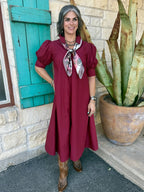 6736DAM — Women's deep maroon puff sleeve pleated swing midi dress with gathered shoulder cap sleeves, fitted elbow-length cuffs, collared placket neckline, and generous A-line swing skirt in crisp poplin fabric — Blair's Western Wear Marble Falls TX