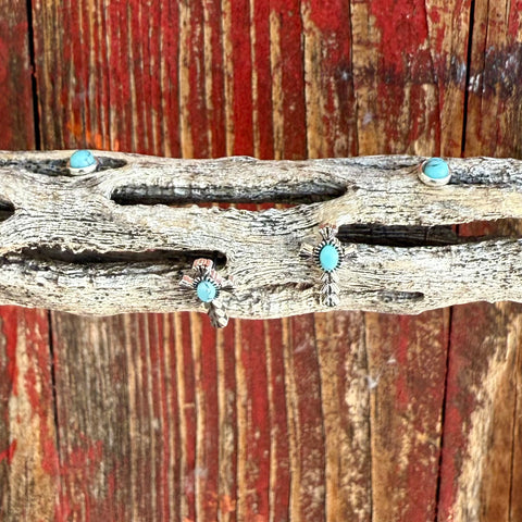 Women’s Montana Silversmiths Cross Turquoise Post Earrings in silver and turquoise, featuring a dual-post design with a simple turquoise stud and a cross-accented turquoise stone, tarnish-resistant finish, and stainless steel posts - ER6319. Available at Blair's Western Wear, Marble Falls, TX.