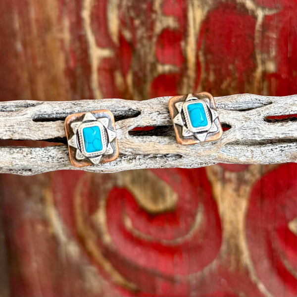 Women's Montana Silversmiths earrings Sienna Canyon in turquoise, square turquoise stone center adds bold Southwestern color while keeping your look refined and versatile, with antiqued silver-tone starburst detailing frames the stone creating depth and dimension - ER6480. Available at Blair's Western Wear, Marble Falls, TX.
