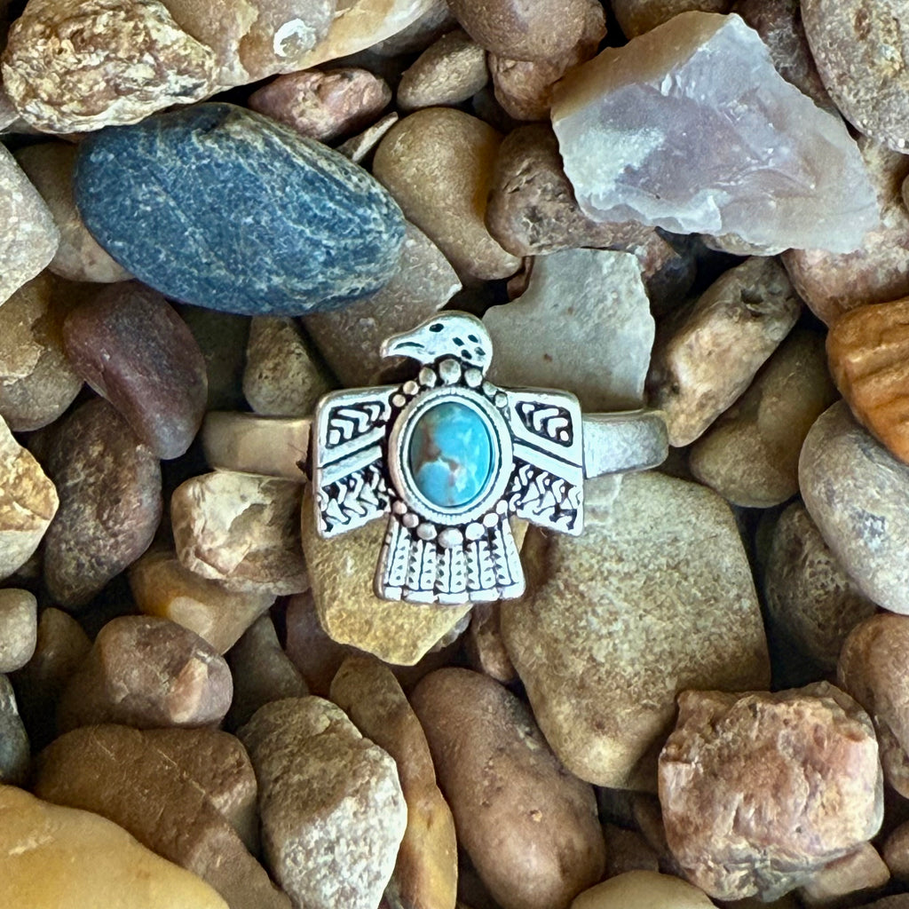 Women’s Montana Silversmiths turquoise thunderbird ring in silver, featuring detailed etching and an adjustable open-back band – RG6315. Available at Blair’s Western Wear, Marble Falls, TX.