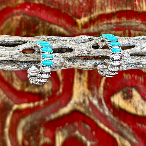 Women’s Montana Silversmiths silver turquoise stone hoop earrings in silver, featuring a secure stainless-steel latch-back closure, with a polished rhodium-plated finish – ER4772. Available at Blair's Western Wear, Marble Falls, TX.