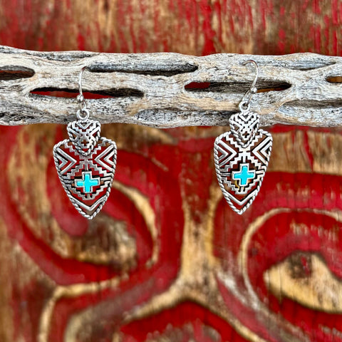 Women’s Montana Silversmiths Southwest silver dangle earrings with turquoise cross inlay, featuring a bold textured pattern and lightweight construction – ER5863. Available at Blair's Western Wear, Marble Falls, TX.