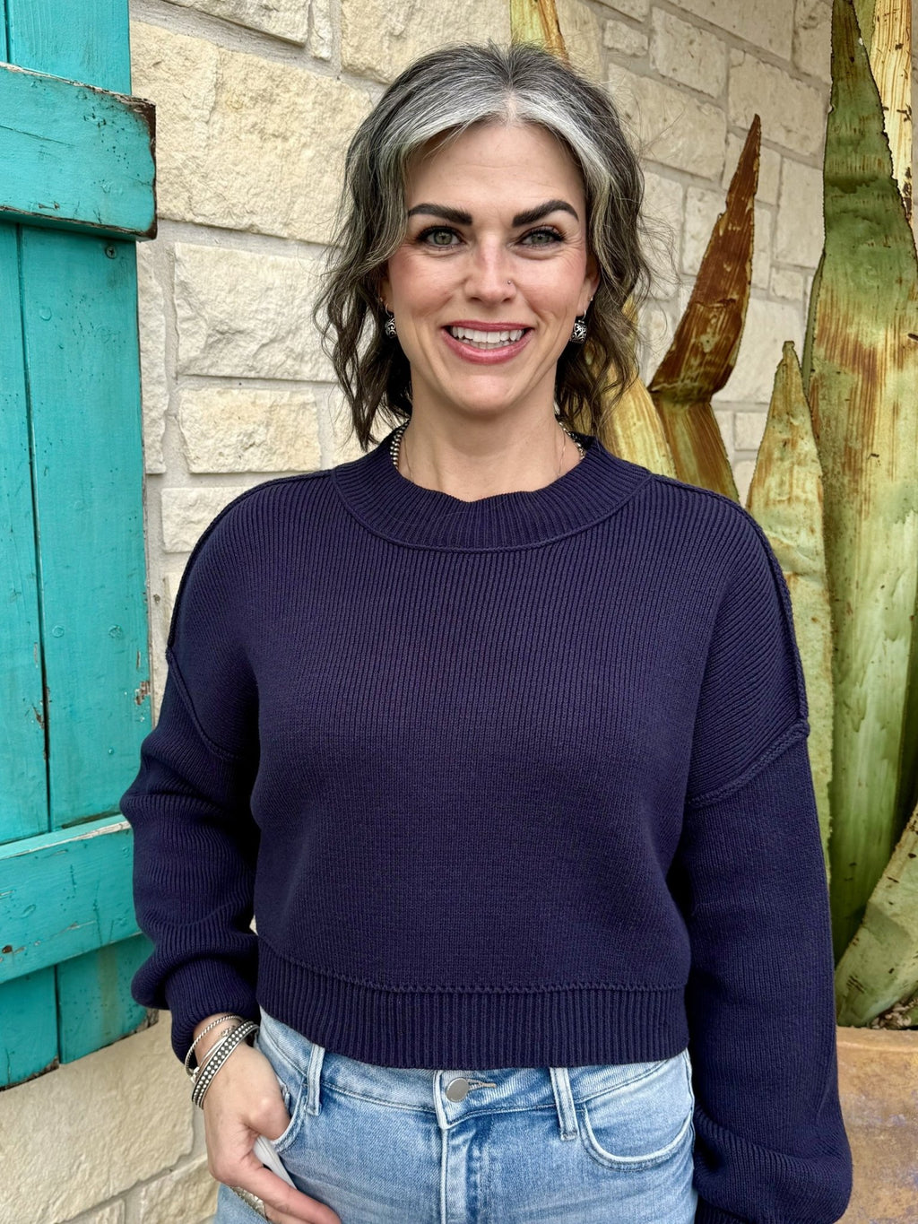 Women’s navy knit cropped sweater with soft ribbed fabric and relaxed fit, featuring drop shoulders and ribbed cuffs - IT10060. Available at Blair's Western Wear, Marble Falls, TX.