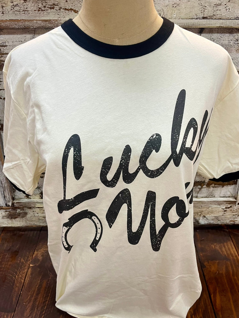 Women's Next Level Summer Tee Shirt in white, featuring lightweight fabric and contrasting black collar, eye-catching distressed graphic. Available at Blair's Western Wear, Marble Falls, TX.