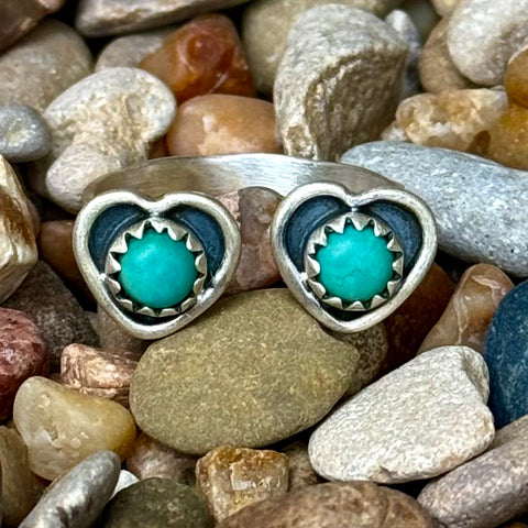 Women’s Nizhoni ring turquoise heart adjustable ring in silver, crafted from sterling silver that offers long-term durability while maintaining a polished finish, features genuine Kingman turquoise stones for unique color variation - NKRN2HRT. Available at Blair's Western Wear, Marble Falls, TX.