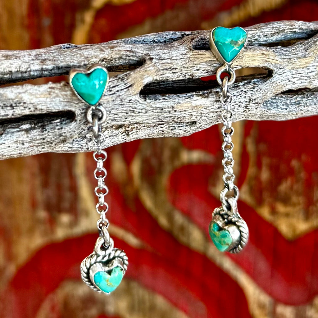 Women's Nizhoni Traders Earrings Dangle Heart Earrings in Turquoise, genuine turquoise heart stud adds vibrant Southwestern color, with delicate silver chain drop that creates soft movement - NZERHRTDANG. Available at Blair's Western Wear, Marble Falls, TX.