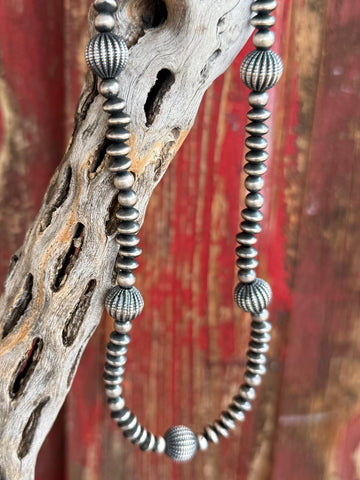 Women's Nizhoni Traders Necklace Sterling Silver Pearl Beaded Necklace in Silver, crafted from genuine sterling silver pearls that develop a rich patina over time, with mixed saucer and Navajo-style melon beads for textured Western style - NZNKBEAD. Available at Blair's Western Wear, Marble Falls, TX.