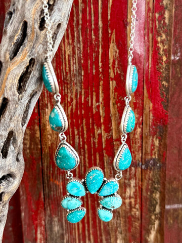 Women's Nizhoni Traders turquoise Naja necklace in blue-green, handcrafted sterling silver construction, with genuine Sonoran Mountain and White Water turquoise stones - NZNKSQUDROP. Available at Blair's Western Wear, Marble Falls, TX.