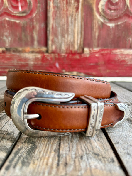 Women’s Nocona Leather Western Belt Magnolia in Peanut, crafted from genuine leather that develops character over time while maintaining durability for everyday wear, with engraved silver-tone Western buckle set for a classic ranch-inspired look - VB10003. Available at Blair's Western Wear, Marble Falls, TX.