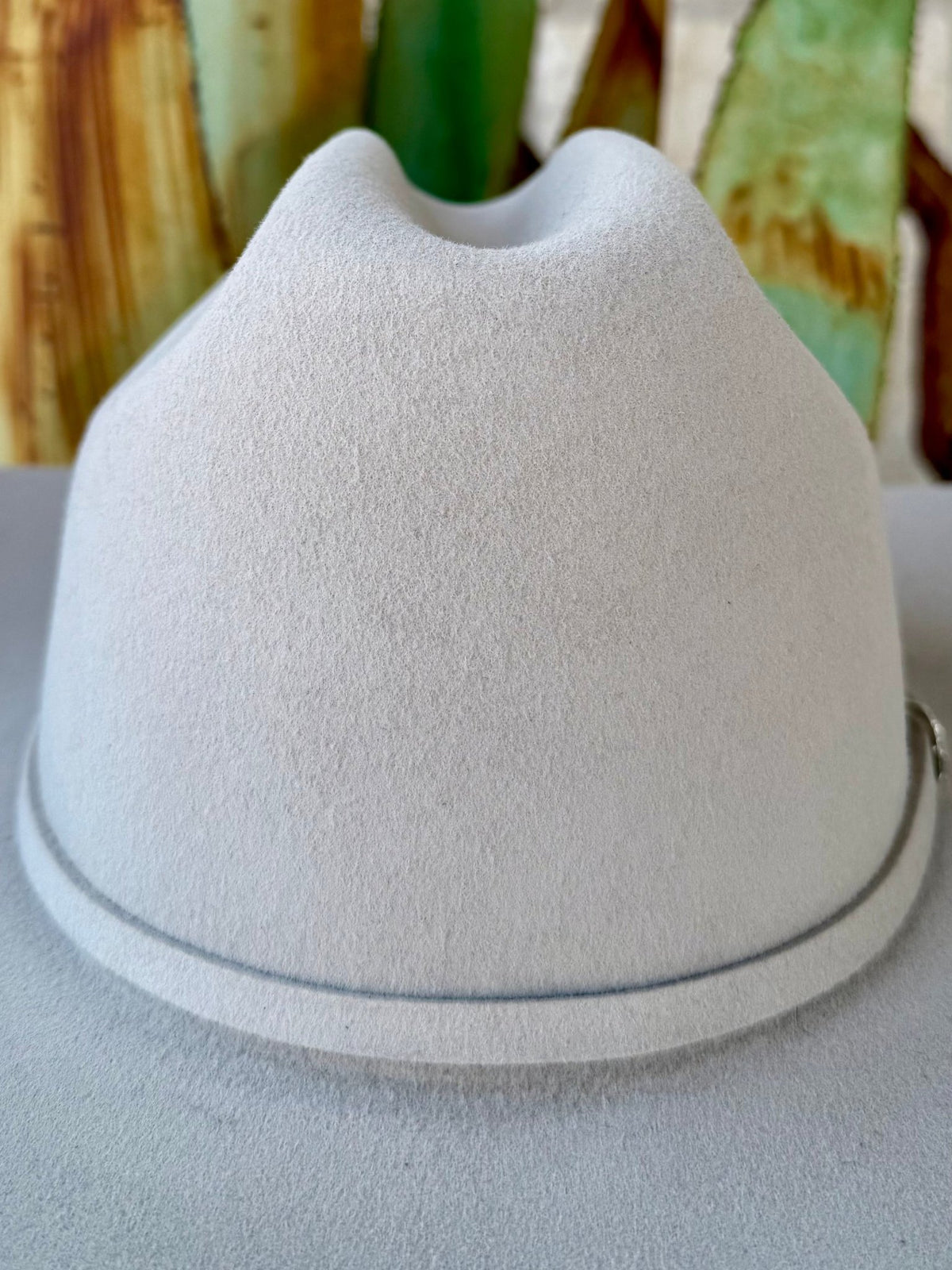 Light Ranch Tan felt cowgirl hat showing a rounded crown front, recessed center crease and narrow matching felt band — Blair's Western Wear Marble Falls TX