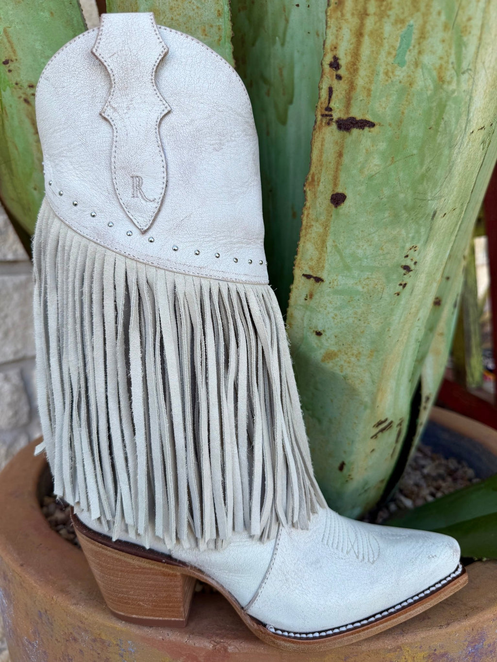 Women’s Reba Western Fringe Leather Boot in white, full-length leather fringe for eye-catching movement, with a snip toe silhouette for a sleek western look – RML223. Available at Blair's Western Wear, Marble Falls, TX.