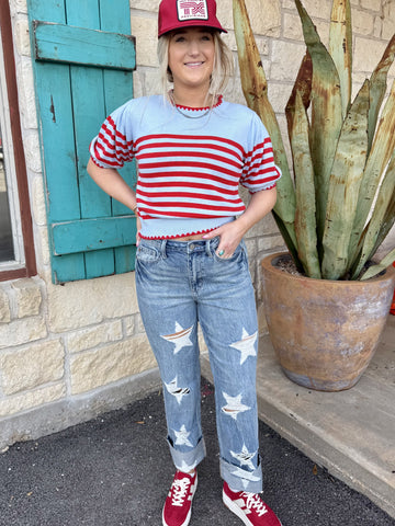 Women’s Risen Jeans Straight Distressed Denim in light wash, star-shaped distressing with cuffed raw hem - 88915. Available at Blair's Western Wear, Marble Falls, TX.