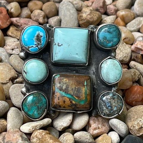 Women's Select Lines Jewelry Concho Ring in Multi-Turquoise, handcrafted with a mix of bezel-set turquoise stones, with a solid sterling silver backing for durability – SELRNMULTI. Available at Blair's Western Wear, Marble Falls, TX.