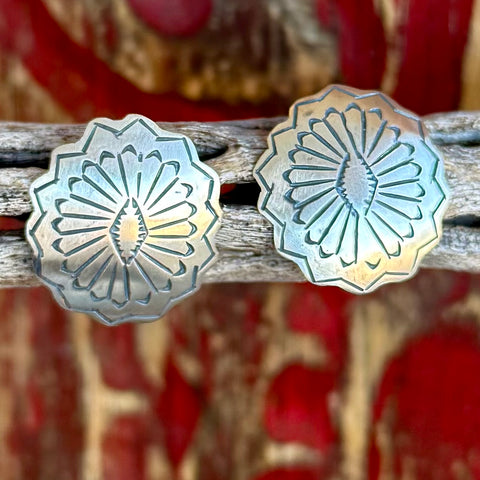 Women's Silver Concho Post Earrings in silver, engraved concho design inspired by traditional Western silverwork, with scalloped edge detailing that frames the floral center pattern - T1416. Available at Blair's Western Wear, Marble Falls, TX.