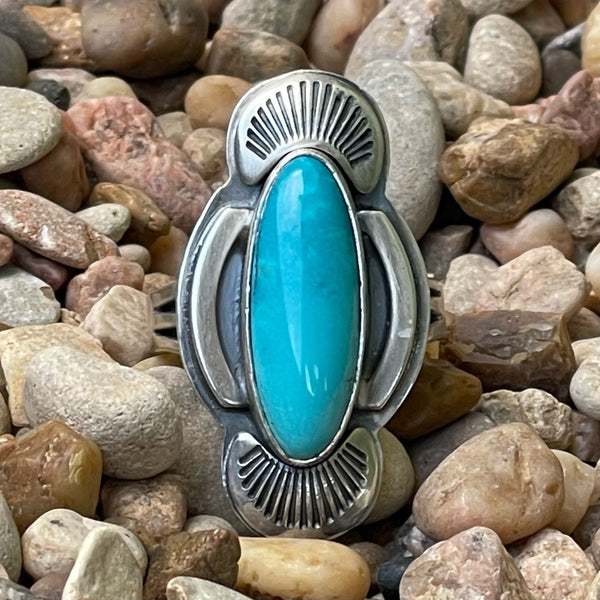 Women's Silver Star Jewelry Ring Turquoise/Silver Oval Shell in turquoise, handcrafted with intricate silver shell detailing, with a genuine turquoise center stone - STARRNSHELL. Available at Blair's Western Wear, Marble Falls, TX.