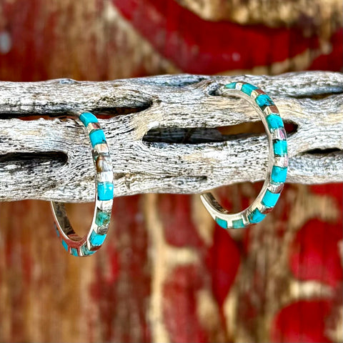 Women's silver turquoise hoop earrings with channel-set turquoise inlay, post-back closure for secure all-day wear, with polished sterling silver framing for durability - T1473TQ. Available at Blair's Western Wear, Marble Falls, TX.