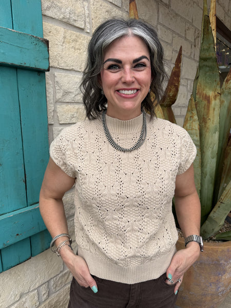 Women’s sweater knit mock neck top in oatmeal / off white, textured cable knit pattern with cap sleeves - SH12722. Available at Blair's Western Wear, Marble Falls, TX.