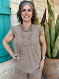 Taupe women's textured blouse with pintuck front, ruffle trim, flutter sleeves, and relaxed fit — Blair's Western Wear Marble Falls TX