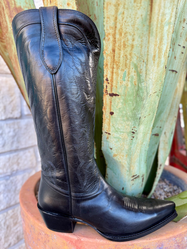 Women’s Tony Lama Western tall boot in black leather, crafted from smooth leather that molds to your foot over time for a personalized fit and long-term durability, with a snip toe design that creates a sleek, feminine profile without sacrificing traditional western character - DR4252. Available at Blair's Western Wear, Marble Falls, TX.