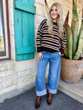 PGC21834 — Women's medium blue wash high-rise wide leg barrel crop jeans with large structured statement double-fold cuff at the ankle showing lighter inside denim tone, relaxed roomy barrel leg silhouette, high-rise natural waist fit, and classic 5-pocket construction — Blair's Western Wear Marble Falls TX