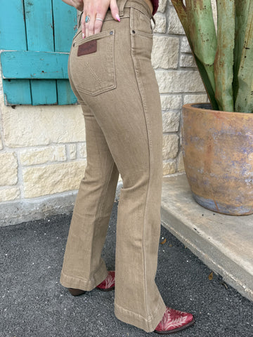 Women’s Wrangler Jeans Flare Denim in khaki, high-rise fit with signature W pocket stitching - 112367575. Available at Blair's Western Wear, Marble Falls, TX.