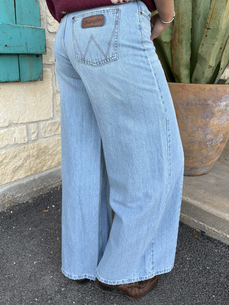 Women’s Wrangler Jeans Wide Leg Denim in light wash, high-rise fit with signature W pocket stitching - 112375003. Available at Blair's Western Wear, Marble Falls, TX.