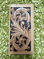 Natural and black leather checkbook wallet with floral scroll tooling and stitched edges — Blair's Western Wear Marble Falls TX