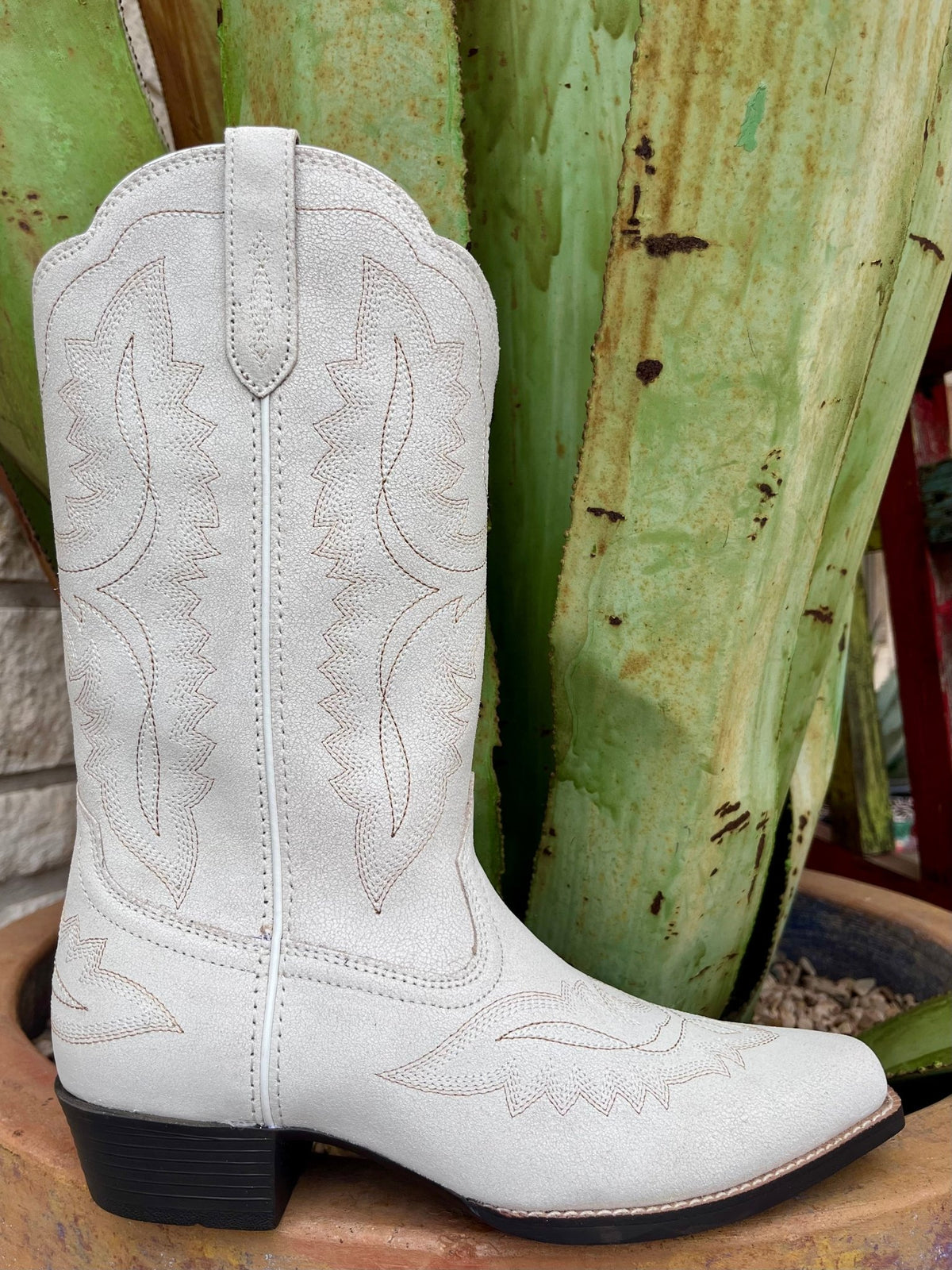 Kids Ariat Western Boot in distressed ivory, crafted from leather and suede, features five-row stitch pattern and embroidery - 10053781. Available at Blair's Western Wear, Marble Falls, TX.