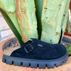 Women’s Birkenstock clog in black suede, featuring a contoured cork-latex footbed for custom comfort, with a chunky EVA sole for shock absorption – 1028317. Available at Blair's Western Wear, Marble Falls, TX.